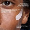 Sunscreen dots near eye, non-greasy oil absorbing lotion texture graphic