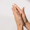 Hands rubbing in Clearing Defense lotion