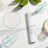 Replenix Age Restore Bio-Repair Serum with petri dishes, droppers and leaves