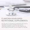Stethoscope on a desk with clinician-developed supplements text
