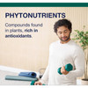 Man lifting a dumbbell with phytonutrients text