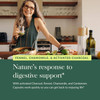 Woman in a kitchen with a drink, fennel, chamomile and activated charcoal graphic