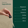 Hand holding a dropper, featured ingredients magnesium, chloride, potassium, sulfate, lithium and boron