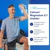 Man exercising with a kettlebell, Calcium/Magnesium 2:1 (malate) benefits graphic