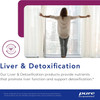 Woman opening curtains to sunlight, Pure Encapsulations liver and detoxification graphic