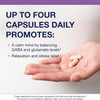 Hand holding Trancor capsules, up to four capsules daily graphic