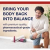Man stretching on a yoga mat, bring your body back into balance graphic
