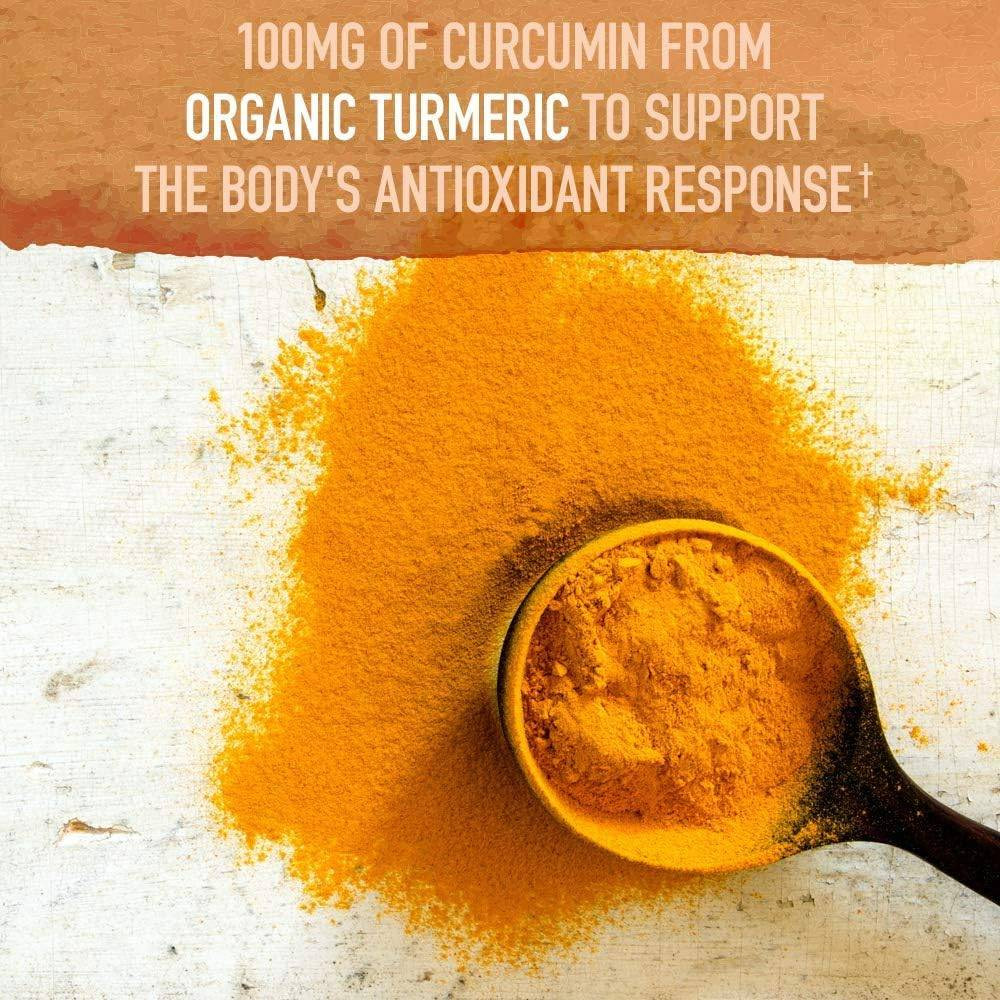 Turmeric powder on a spoon, 100 mg of curcumin from organic turmeric graphic