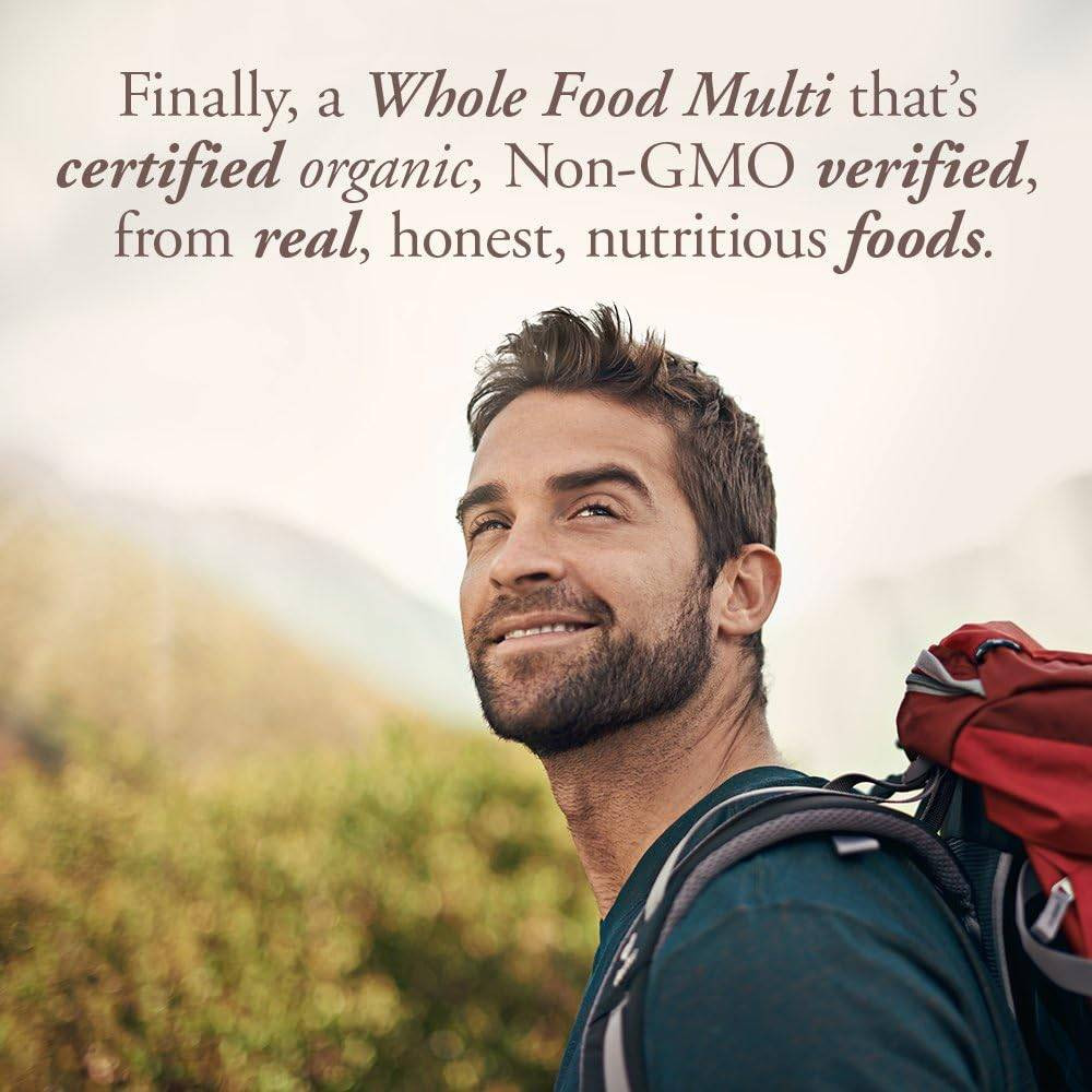 Smiling hiker with whole food multi text