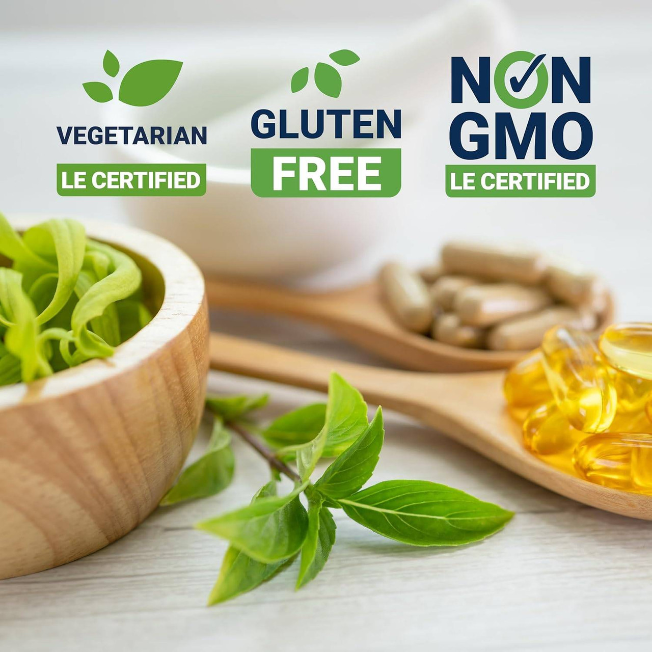 Capsules and softgels with leaves and vegetarian, gluten free and non-GMO badges
