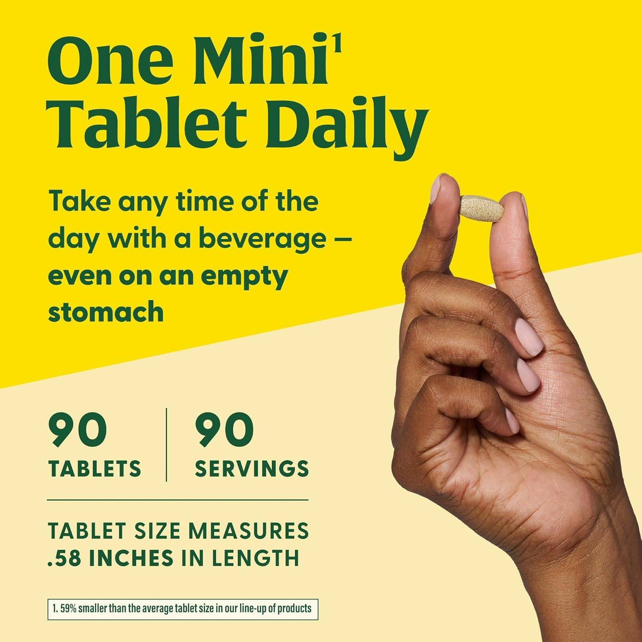 Hand holding mini tablet, one mini tablet daily, 60 tablets, 60 servings