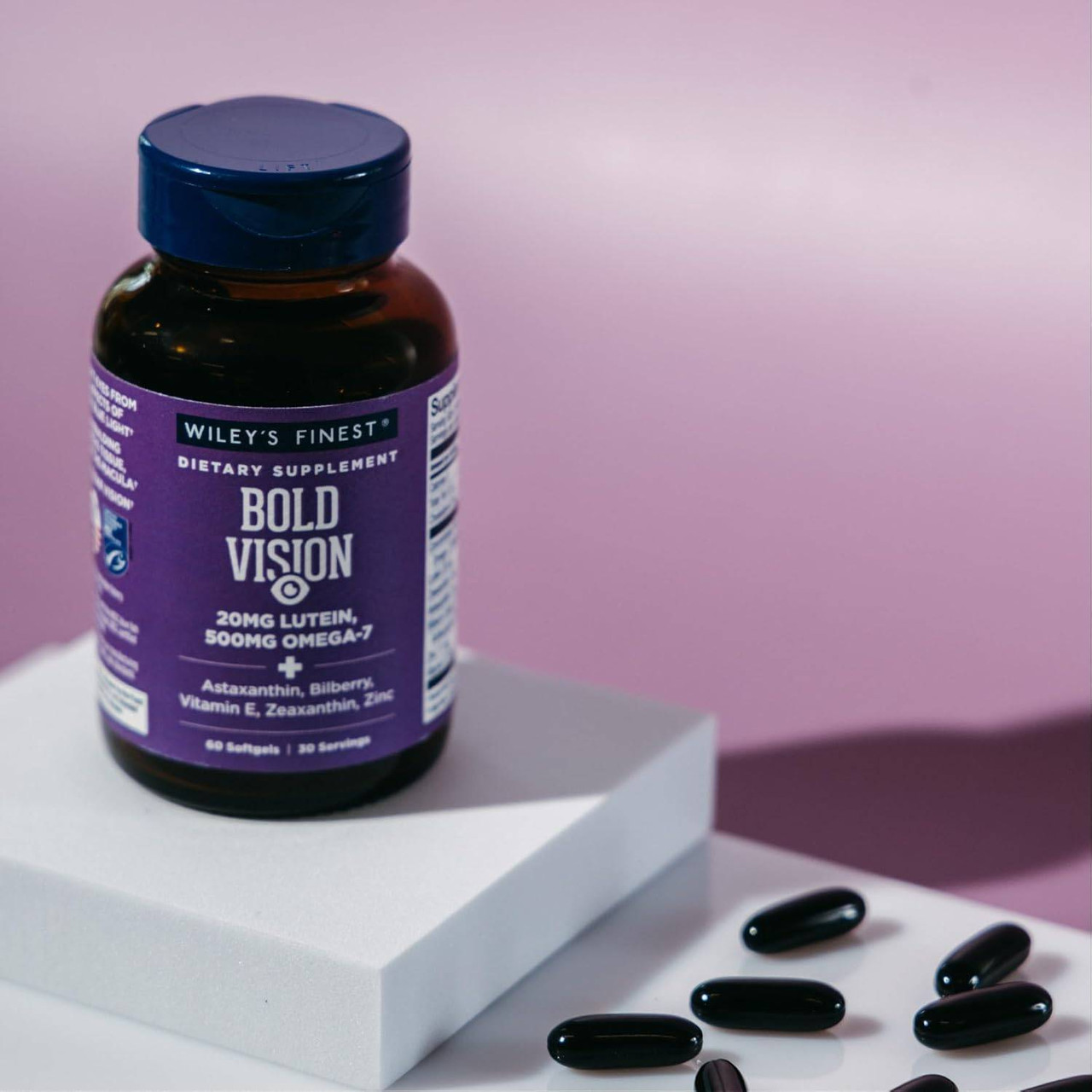 Bold Vision bottle on a white pedestal with softgels