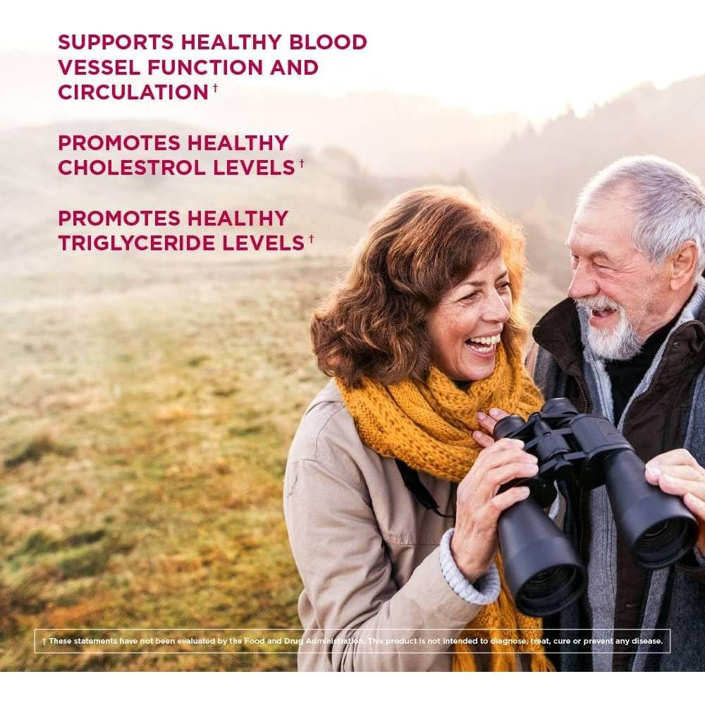 Smiling older couple with binoculars beside heart health support text