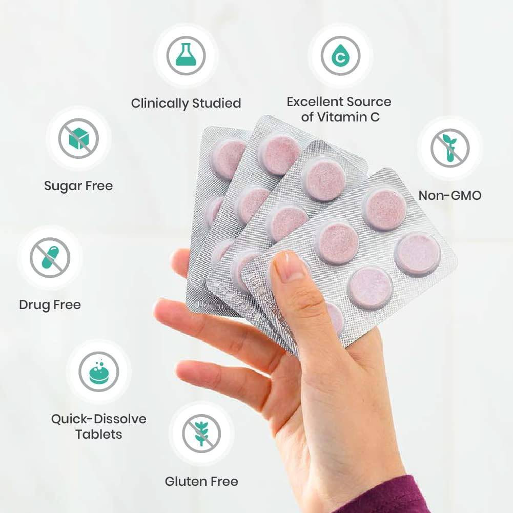 Hand holding Neo40 blister packs with sugar-free, gluten-free, non-GMO icons