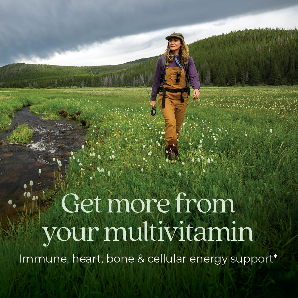 Woman hiking in a meadow, get more from your multivitamin graphic
