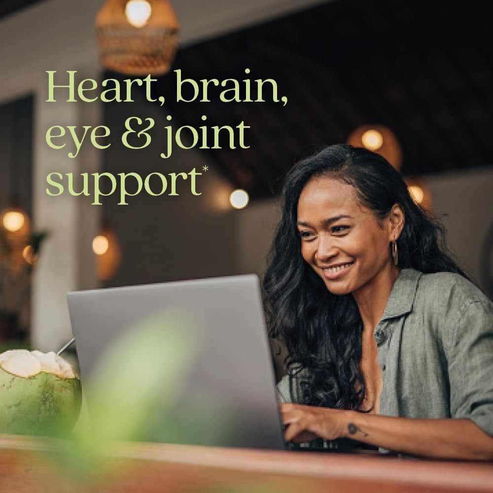 Woman with laptop, heart brain eye and joint support lifestyle graphic