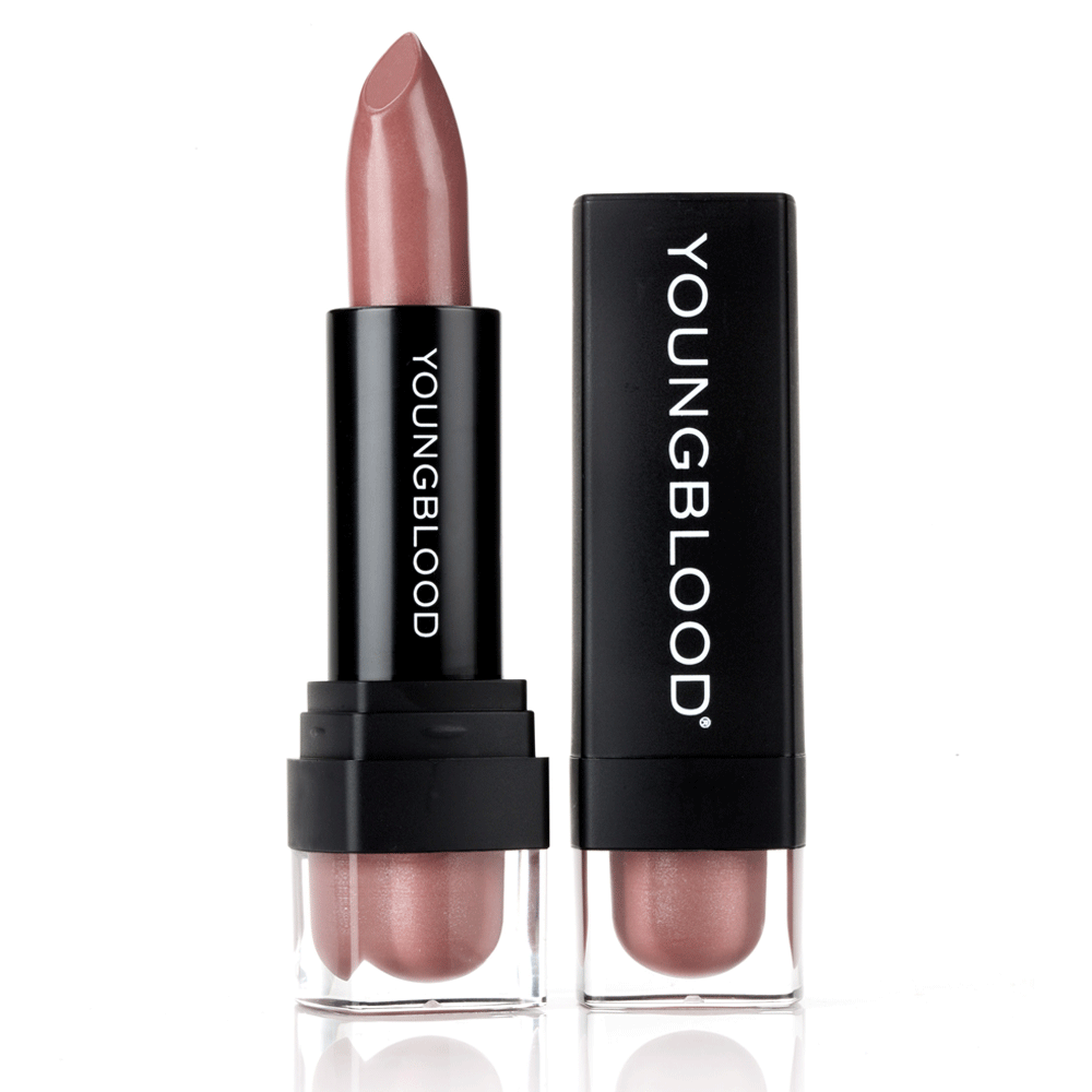 Youngblood Lipstick in a soft beige nude shade beside its black cap