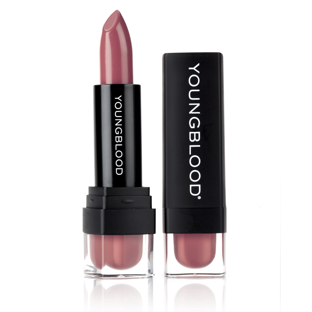 Youngblood Lipstick in a soft rose pink shade beside its black cap