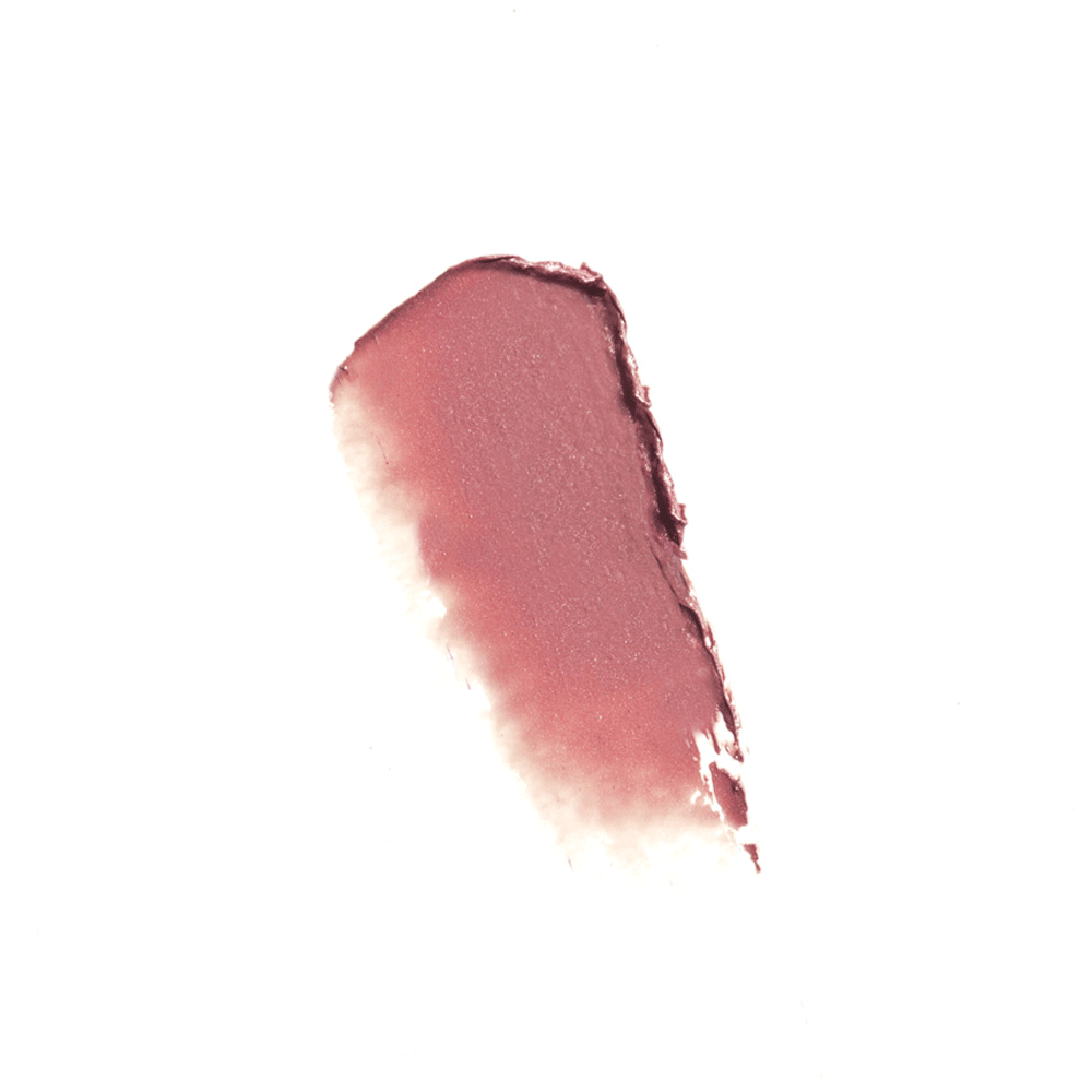 Swatch of soft rose pink Youngblood Lipstick