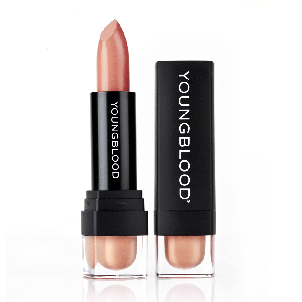 Youngblood Lipstick in a light peach nude shade beside its black cap