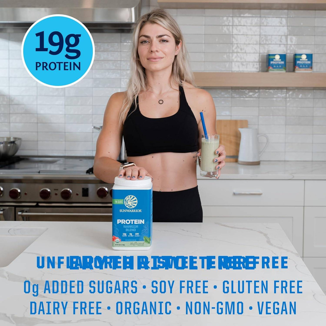 Woman in a kitchen with a shake and the tub, 19 g protein, 0 g added sugars, soy, gluten and dairy free