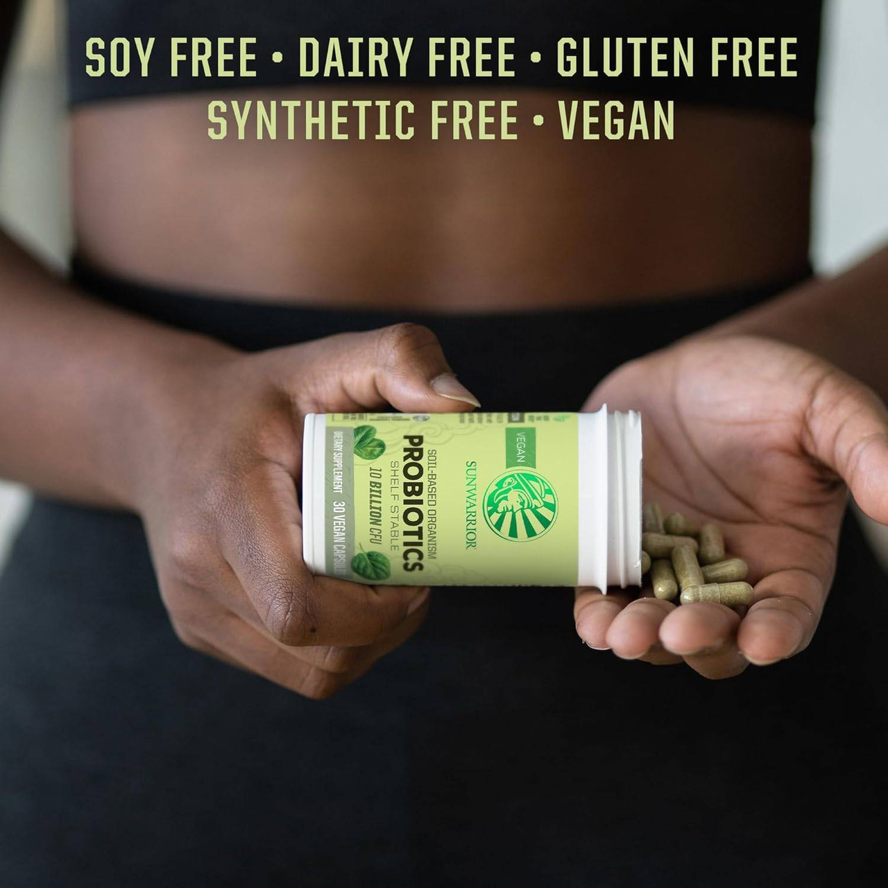 Hands holding Probiotics bottle and capsules soy dairy gluten synthetic free vegan icons