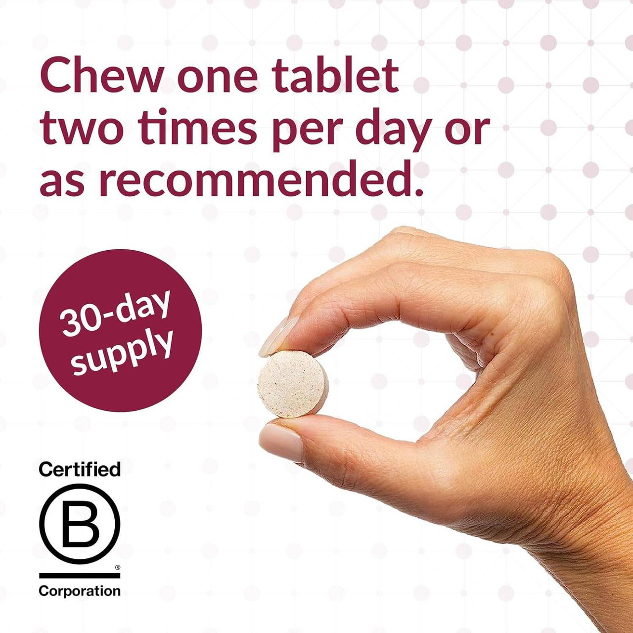 Hand holding a chewable tablet, chew one tablet two times per day