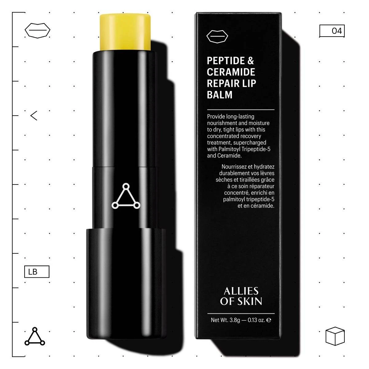 Lip balm stick beside its black box