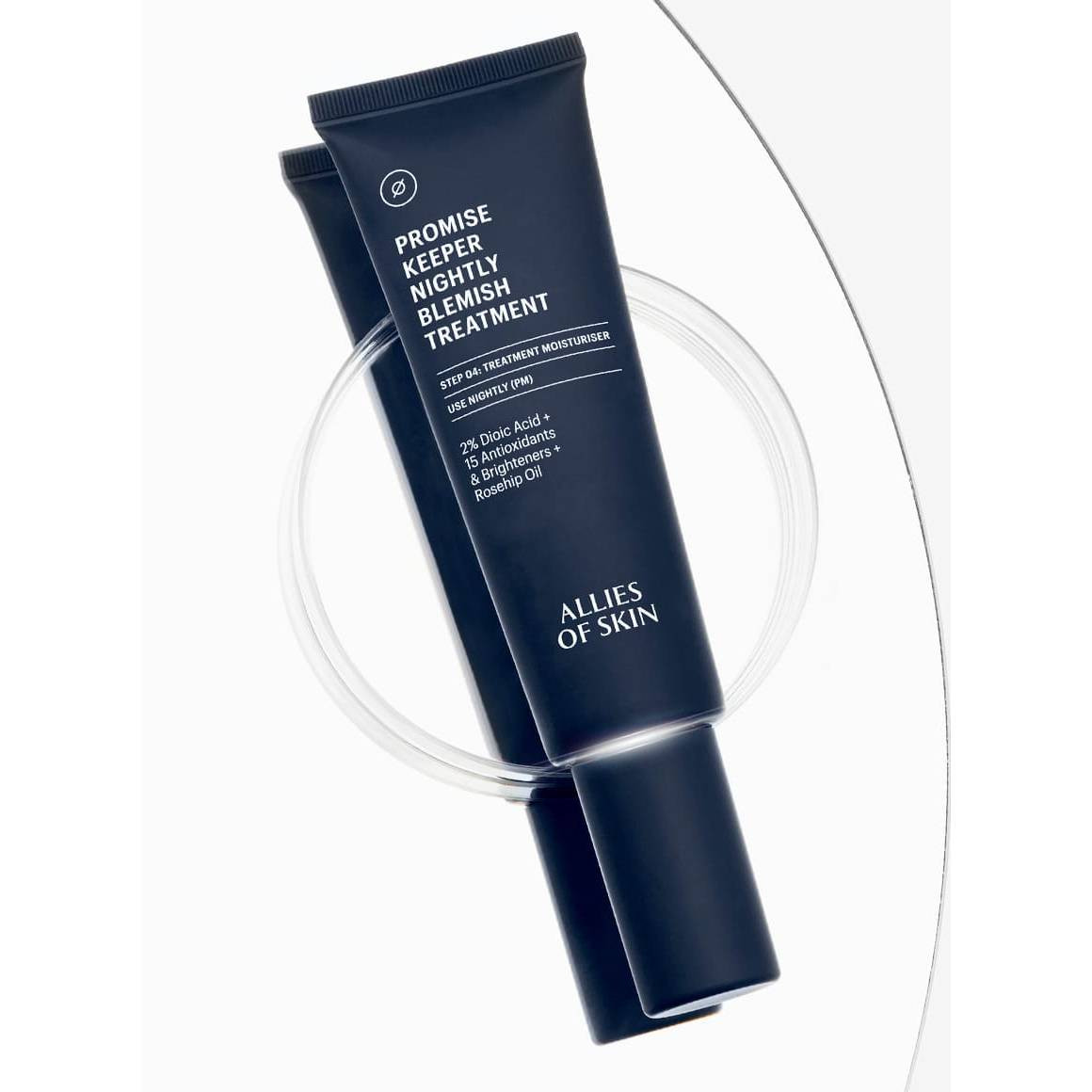 Promise Keeper Nightly Blemish Treatment tube on light circular graphic