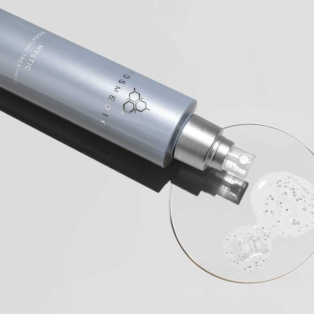 Mist bottle lying beside a dish of clear gel