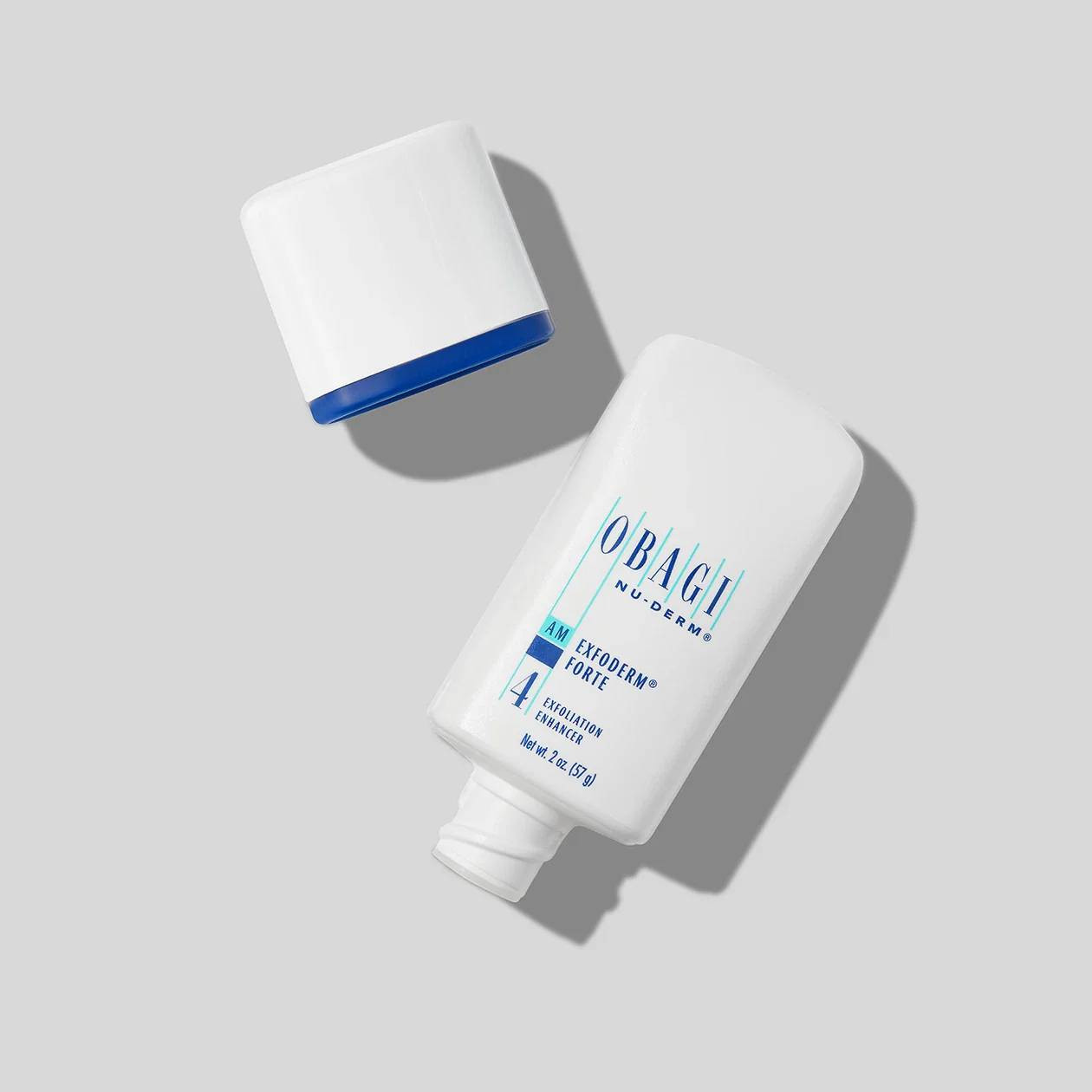 Obagi Nu-Derm Exfoderm Forte bottle with cap removed on gray background