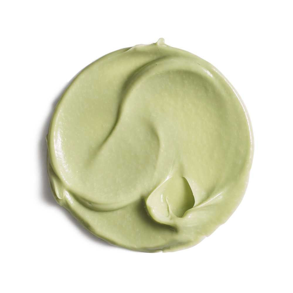 Swirl of pale green body cream