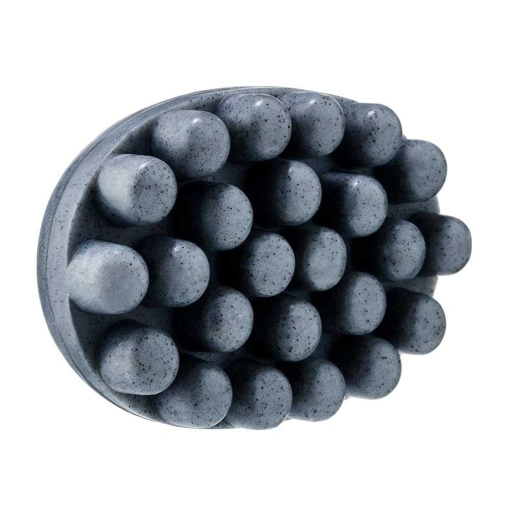 Back of the charcoal body bar with massaging nubs