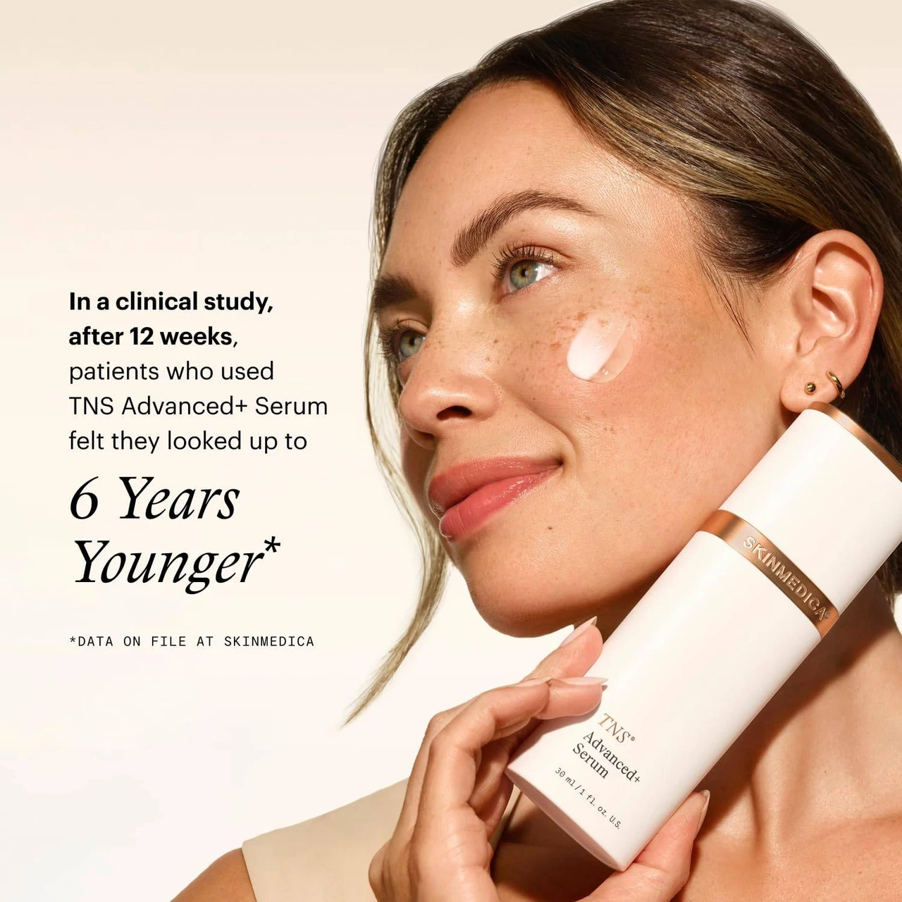 Model holding SkinMedica TNS Advanced+ Serum with clinical study results text