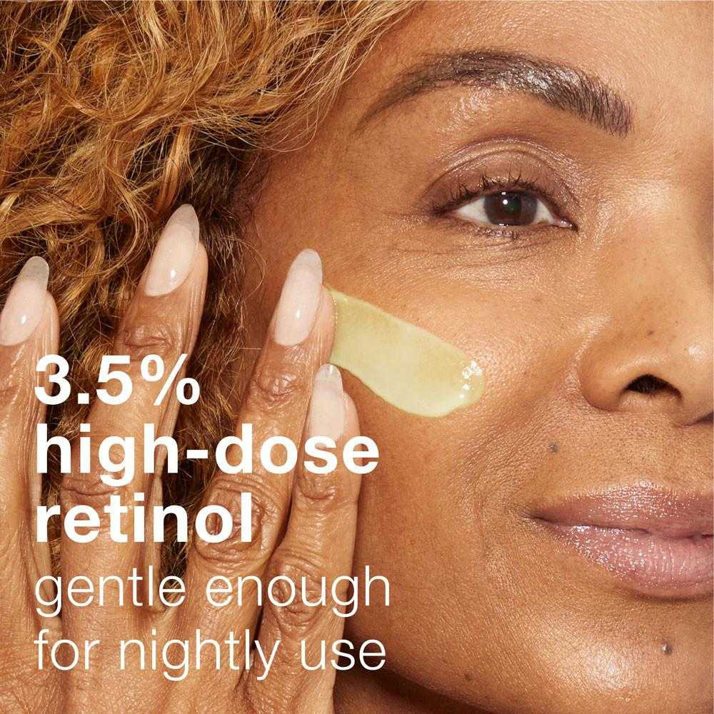 Woman applying serum to cheek, 3.5% high-dose retinol gentle for nightly use text