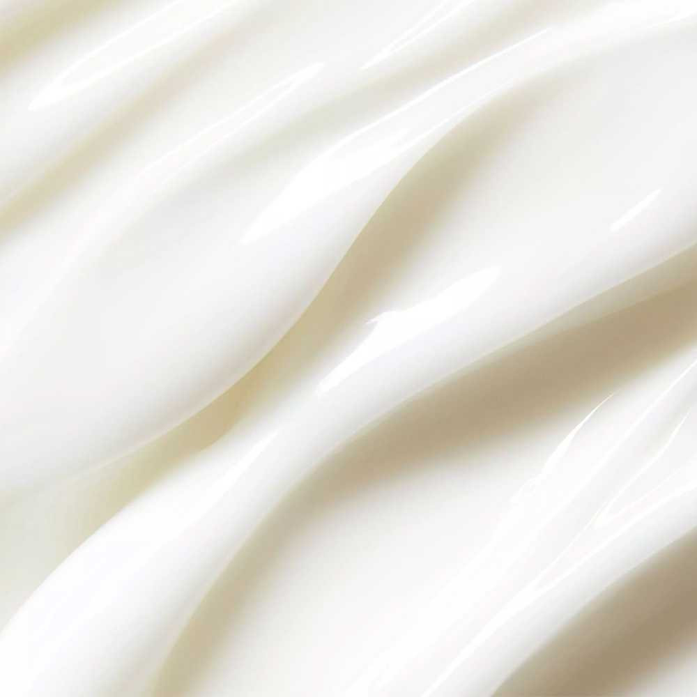 Close-up of creamy white lotion texture