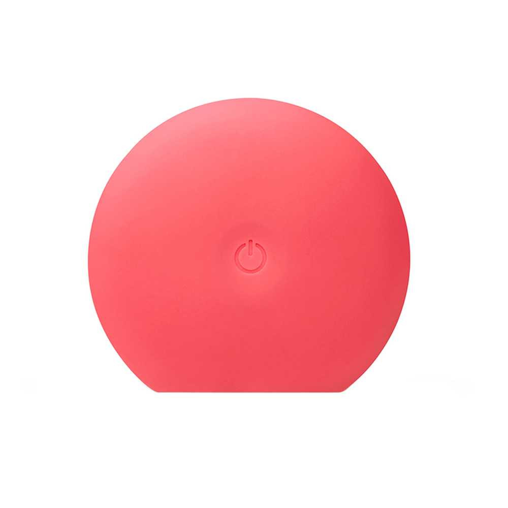 Smooth back of the coral LUNA Play Plus 2 with power button