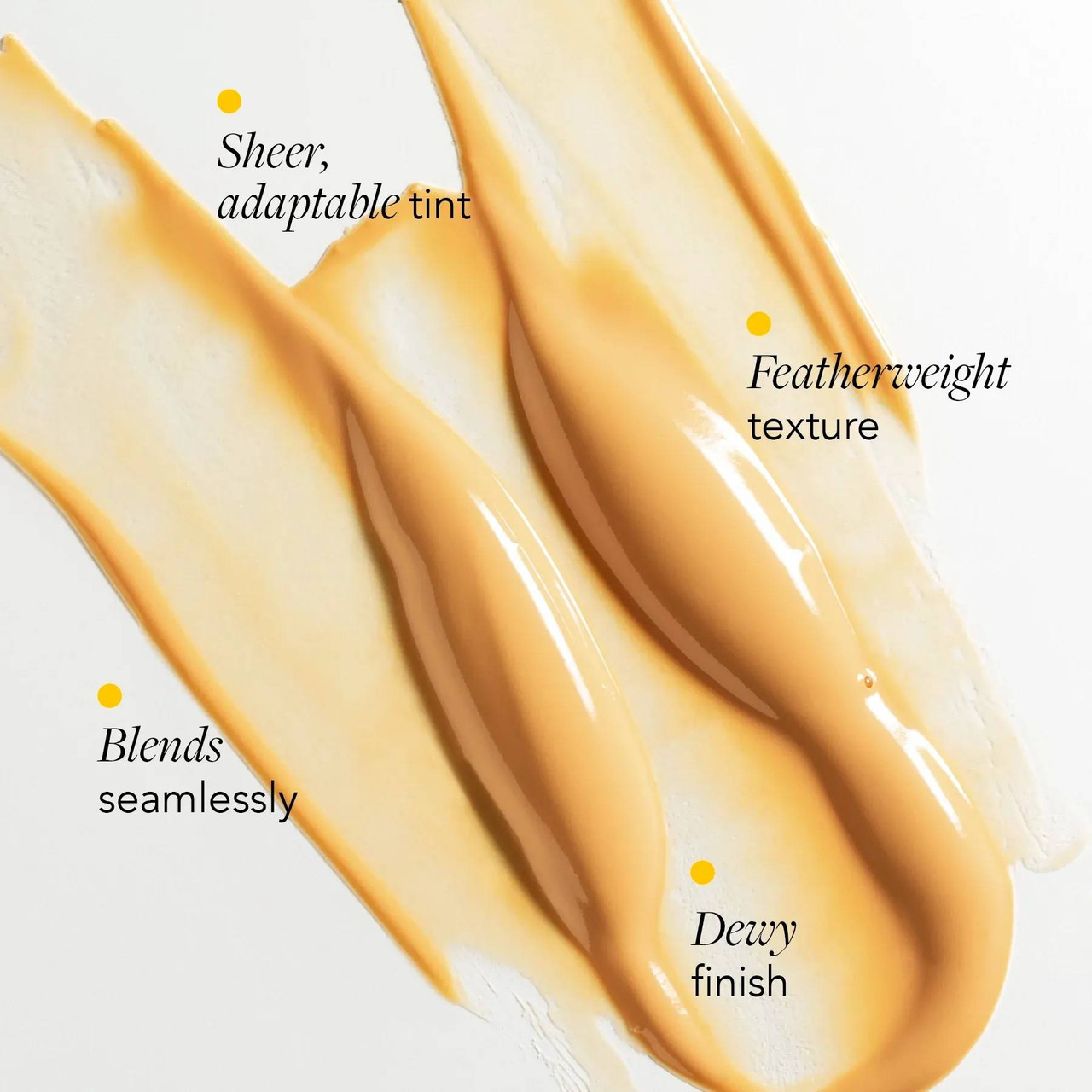 Swatch of tinted sun serum with sheer tint, featherweight and dewy finish callouts
