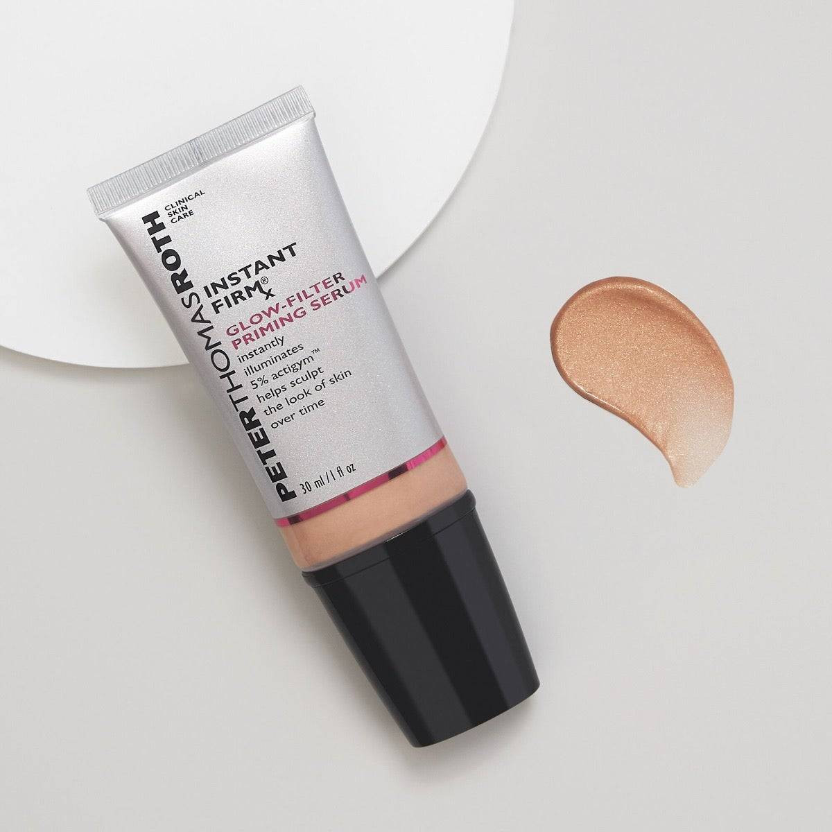 Instant FirmX Glow Filter tube with a swatch of luminous serum