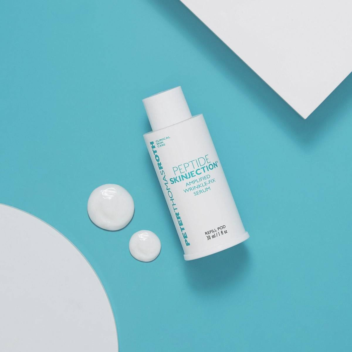 Peptide Skinjection refill pod with serum drops on a teal background