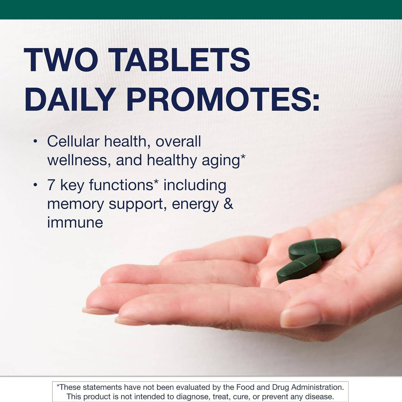 Hand holding two tablets with daily serving text