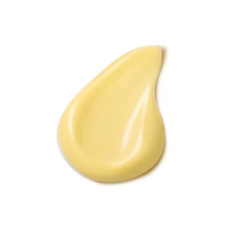 Swatch of Quince Day Cream showing its yellow cream texture
