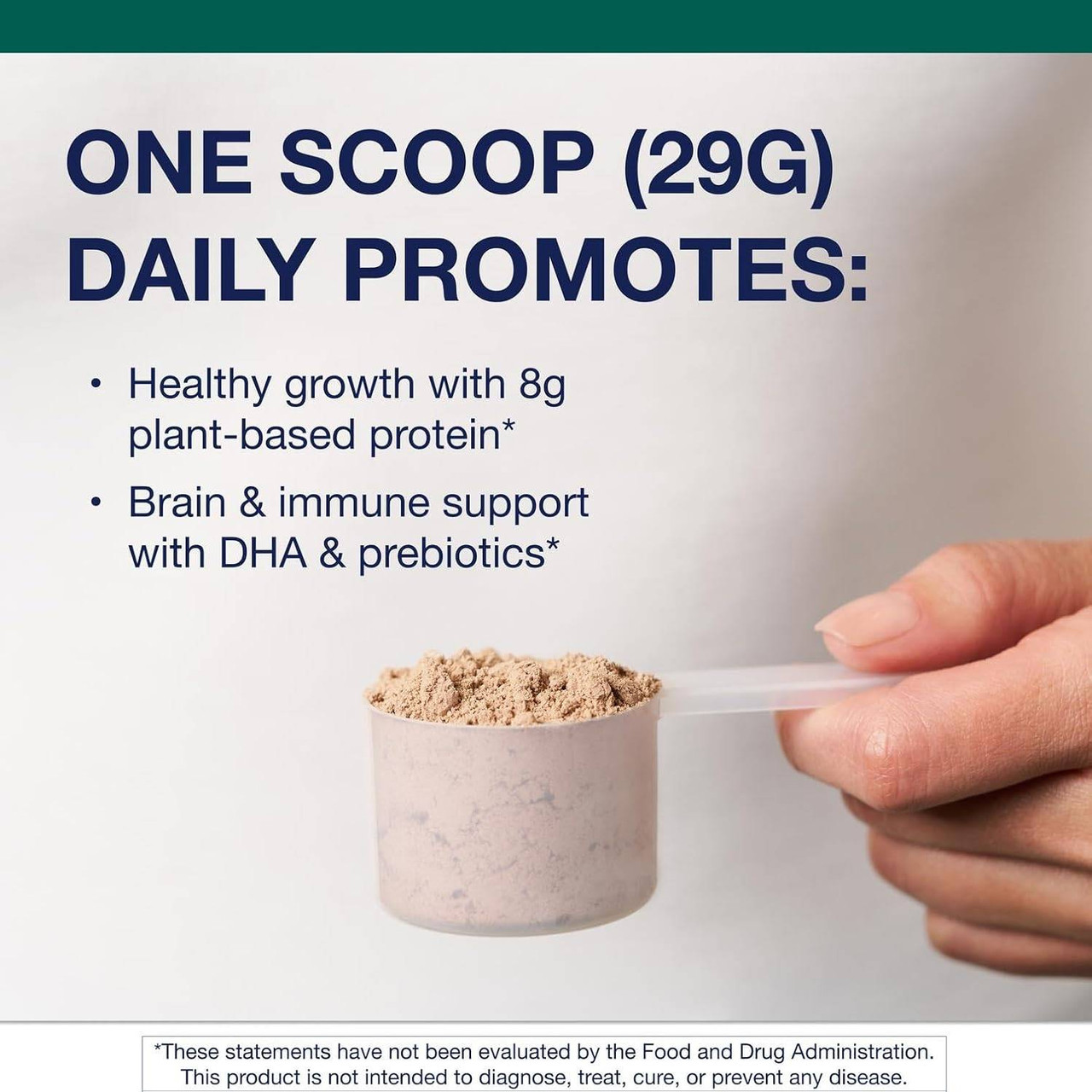 Hand holding a scoop of powder, one 29 g scoop daily graphic