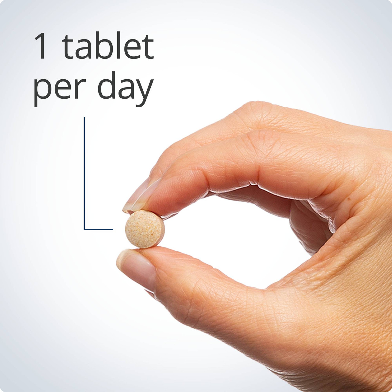 Hand holding a Hemagenics tablet, 1 tablet per day graphic