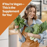 Smiling woman holding fresh greens, if you're vegan this is the supplement for you