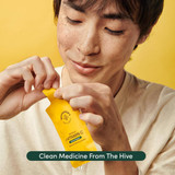Person opening a propolis packet, clean medicine from the hive graphic