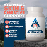 Neem Plus bottle on a rock, Ayurvedic skin and digestive support callouts