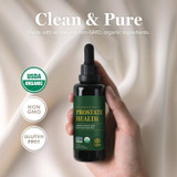 Hand holding Prostate Health bottle, clean and pure graphic with USDA Organic, non-GMO and gluten free badges