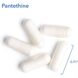 Pantethine capsules beside a 0.91 inch size marker