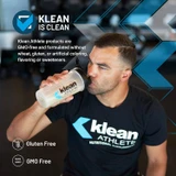 Athlete drinking from a shaker bottle, Klean is clean graphic, GMO-free, no wheat, gluten or artificial additives